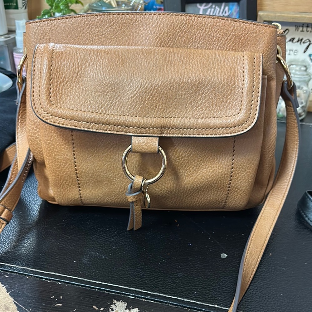 Rosetti Tan Crossbody Bag with Adjustable Strap and Tassel Accents